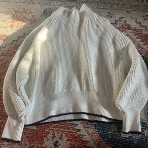 white and black h&m sweater